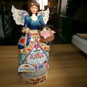 2009 Jim shore figure joy of a beautiful quilt.